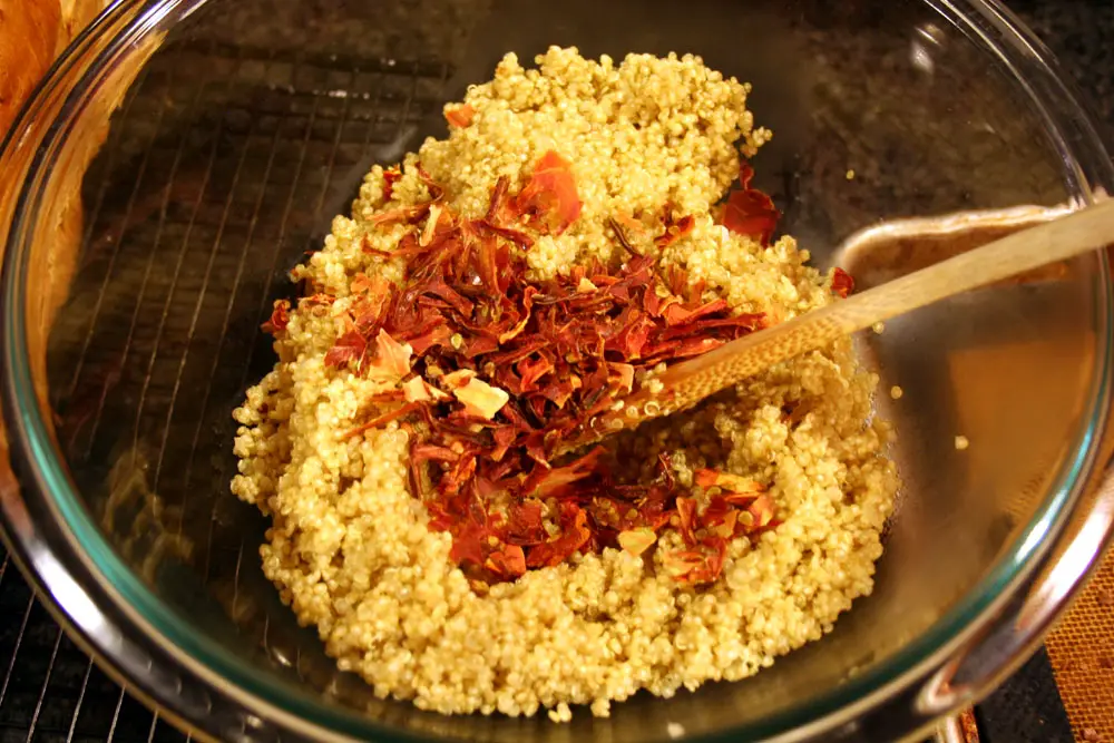 add the dried tomatoes to millet 