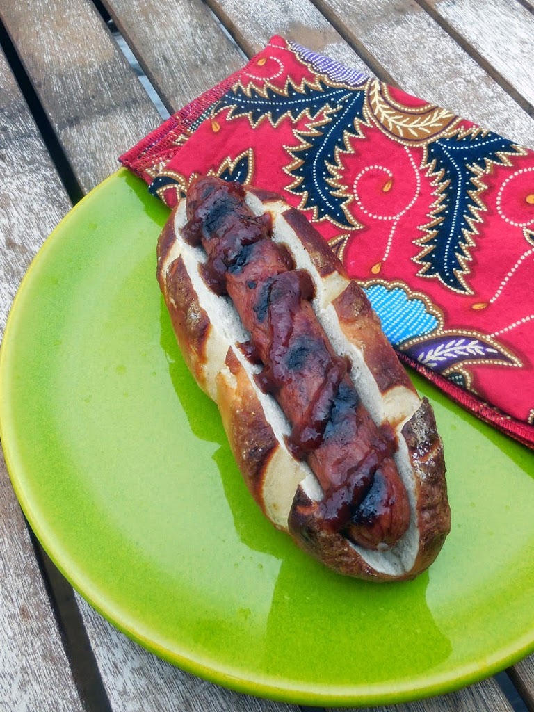 grilled hot dog in pretzel hot dog bun