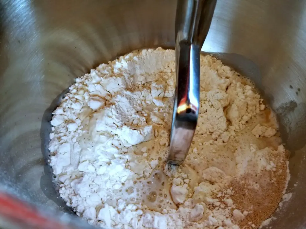 ingredients for crumpets in mixing bowl