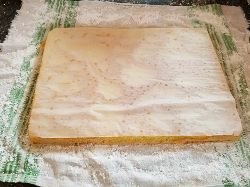 flipped cooked cake on top of prepared towel