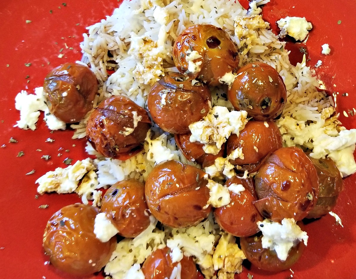 burst tomatoes with torn mozzarella on rice with balsamic vinaigrette