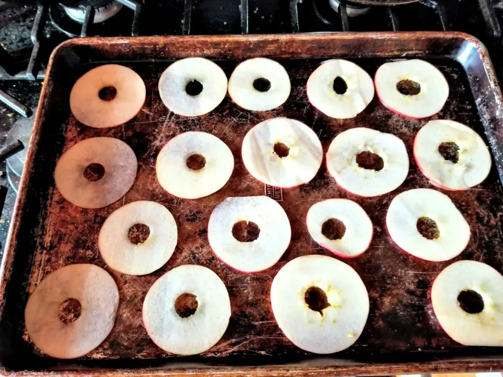 sliced apples on baking tray