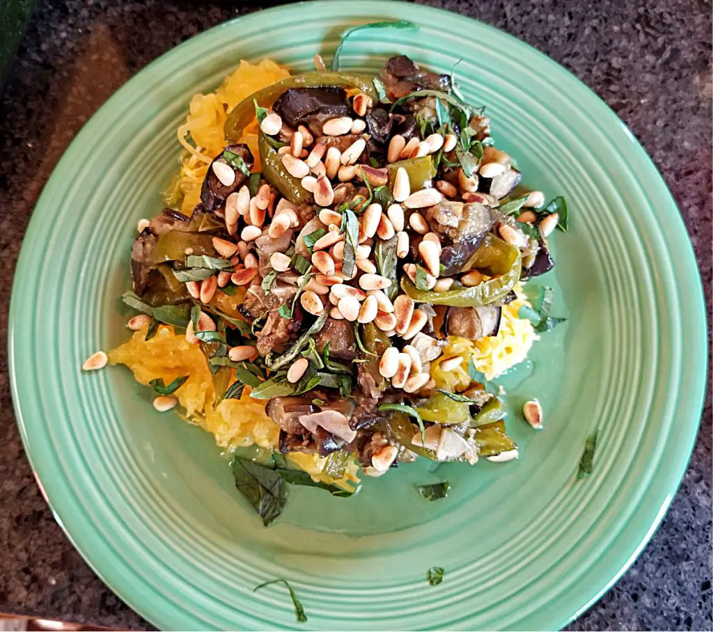 plated spaghetti squash with roasted vegetables