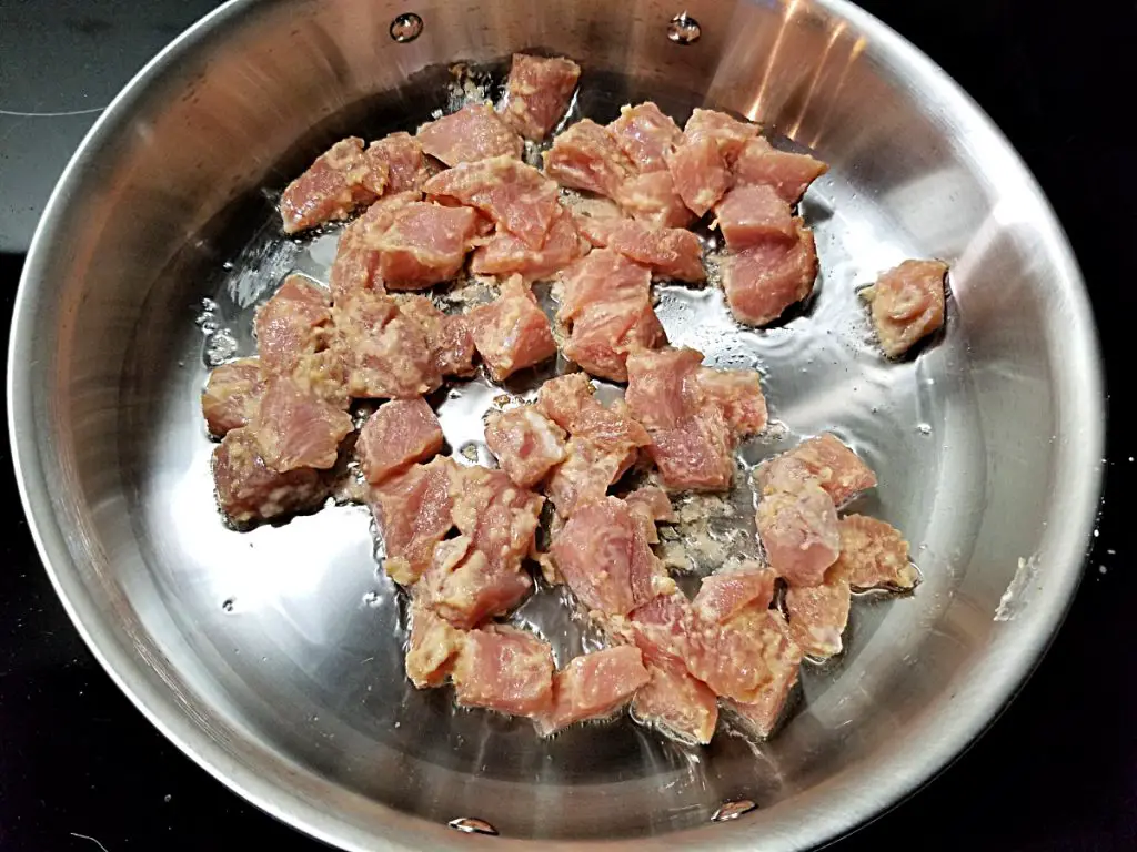 add pork to hot pan
