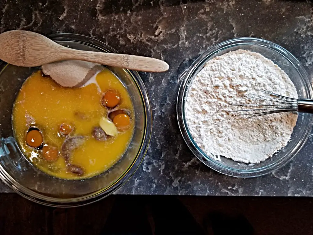two bowls; one with wet and one with dry ingredients
