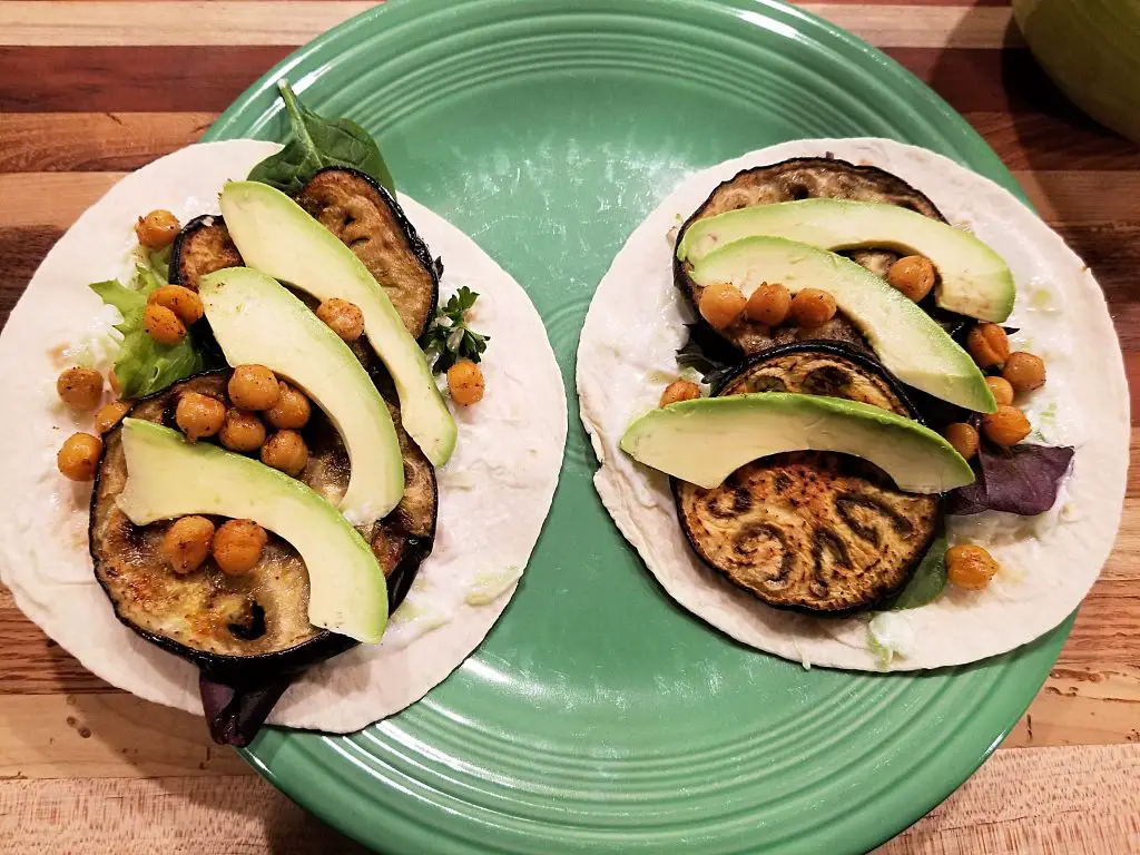 plated tortillas on green plate